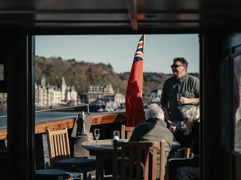 People relaxing on board Glen Massan