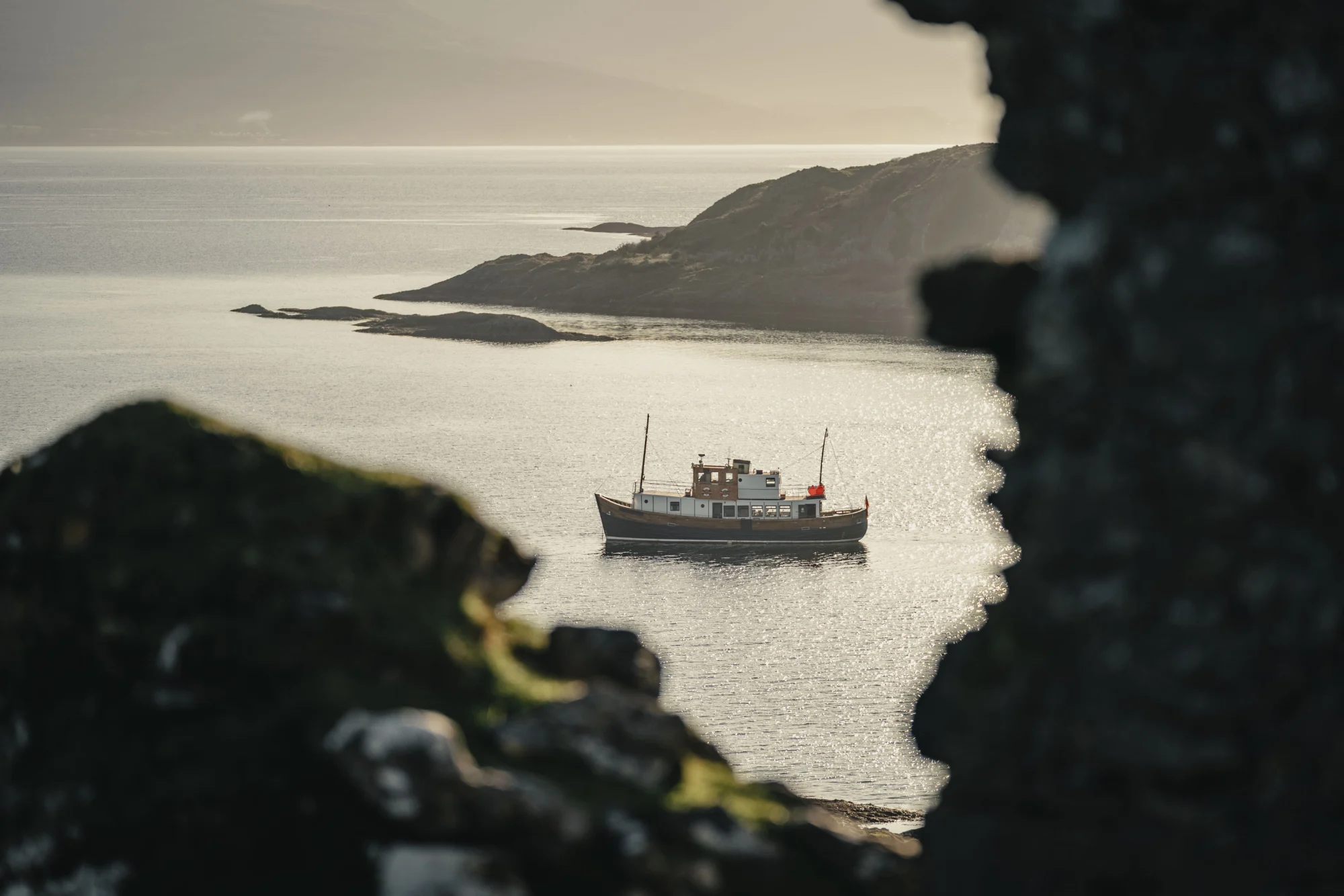 Vessel sitting anchored just off the coast